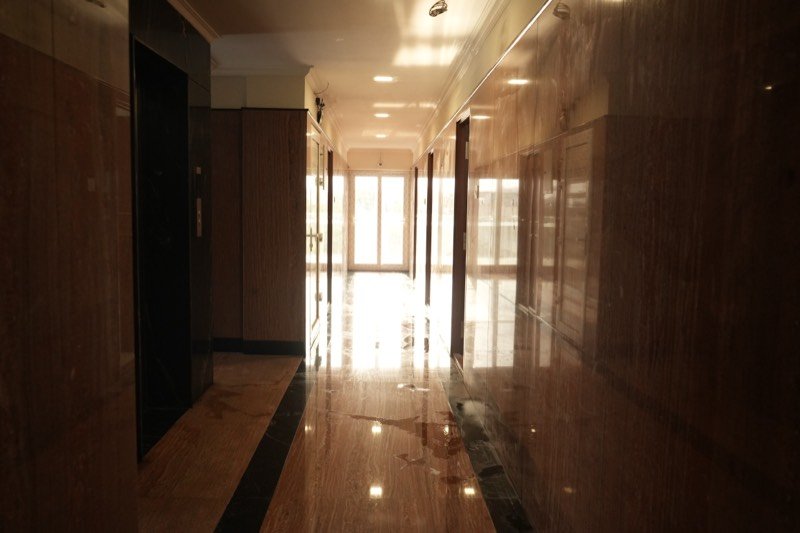Corridor leading to the lift lobby