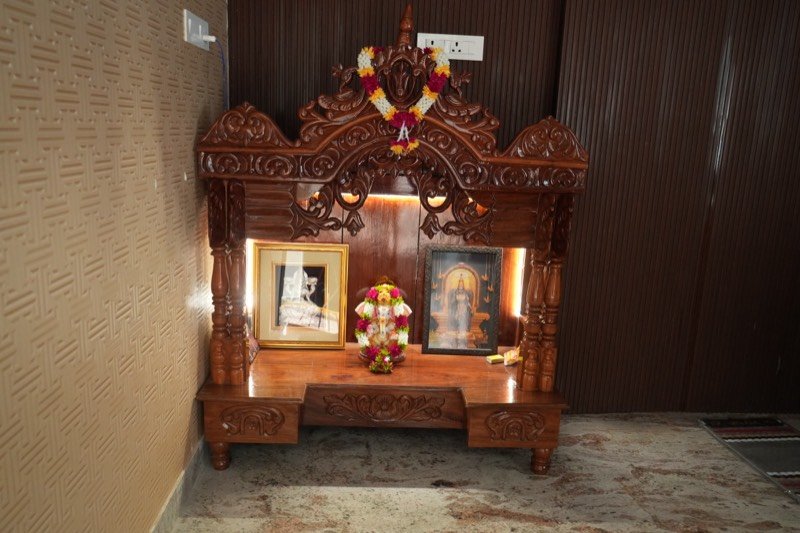 Carved wooden shrine in the SRK Clasic lobby