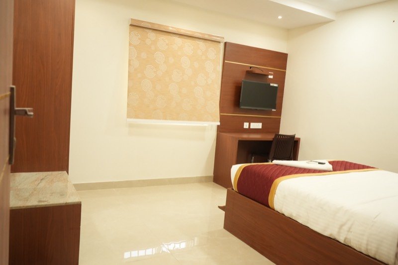 Premium King Suite seen from the doorway, showing the full floor area